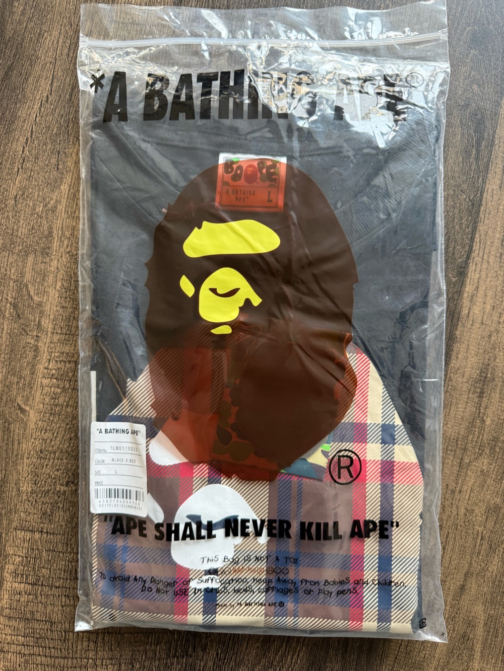 A Bathing Ape (BAPE) Tee with Brown & Red Ape Head